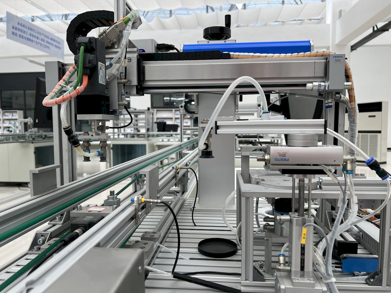 about-02 Close-up view of modern automation machinery in an industrial setting.